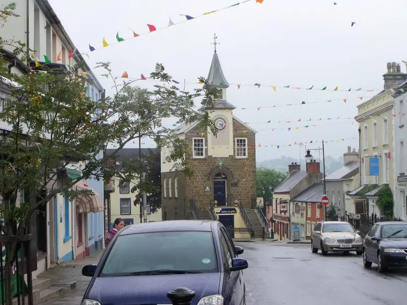 Narberth's High Street hung with bunting, with the small town hall and its clock turret in the middle