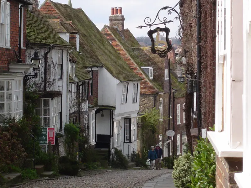 The steep cobbled Mermaid Street in Rye, lined with timber-framed and tile-hung houses